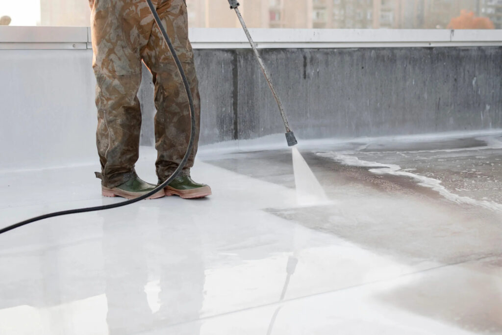 man uses power washer on roof scaled ezgif.com webp to jpg converter